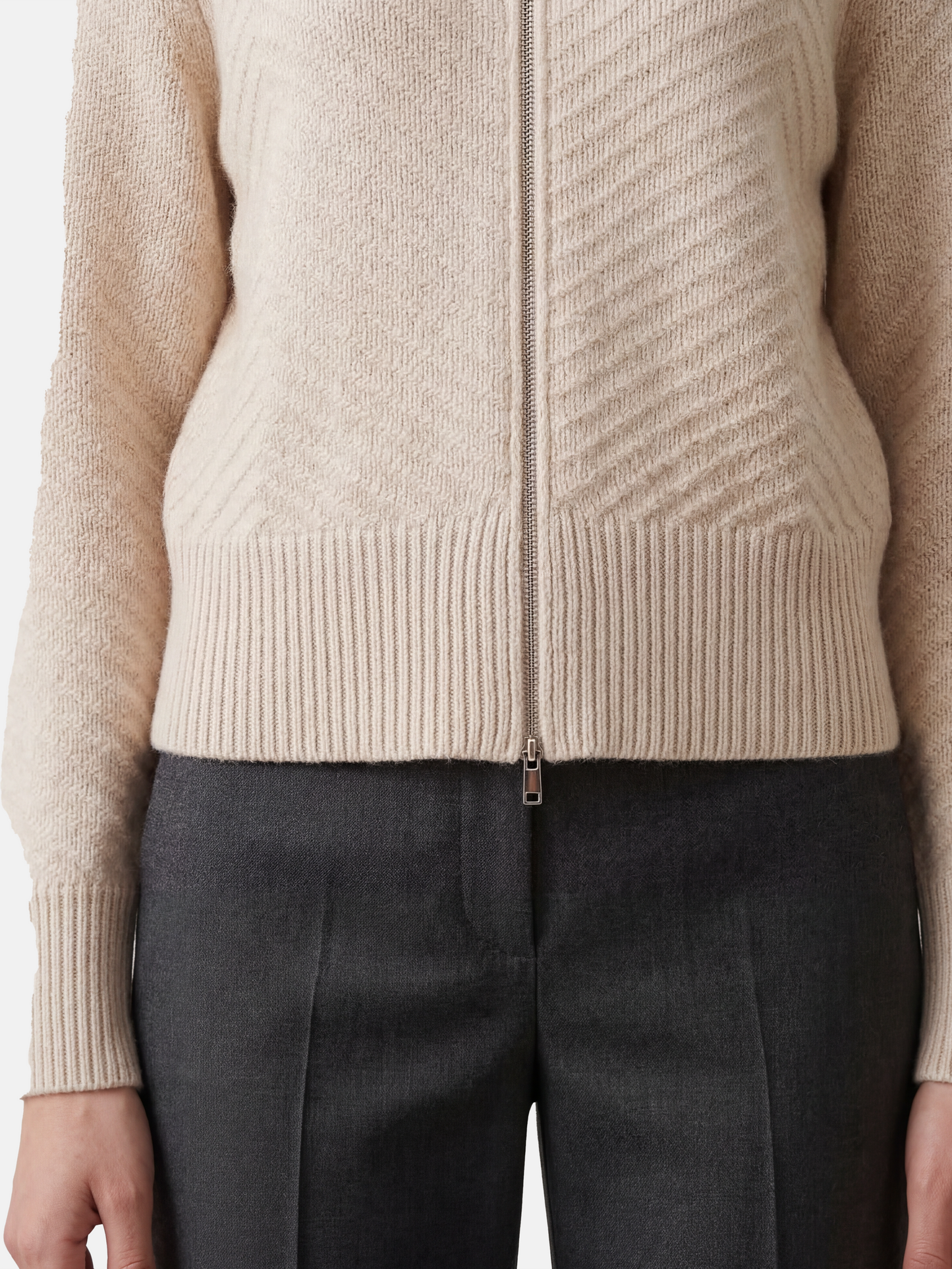 SELVANE herringbone cashmere zip-up cardigan sweater with high ribbed collar, relaxed fit, and chevron knit texture.