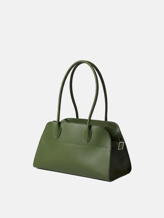 Structured deep navy saddle leather top handle bag with clean curves and elegant trapezoid shape.