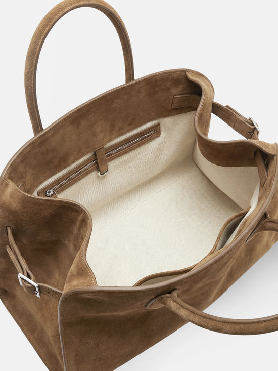 SELVANE Arched Suede Top-Handle Bag, featuring a domed silhouette and velvet-touch surface, presented on a minimalist background.