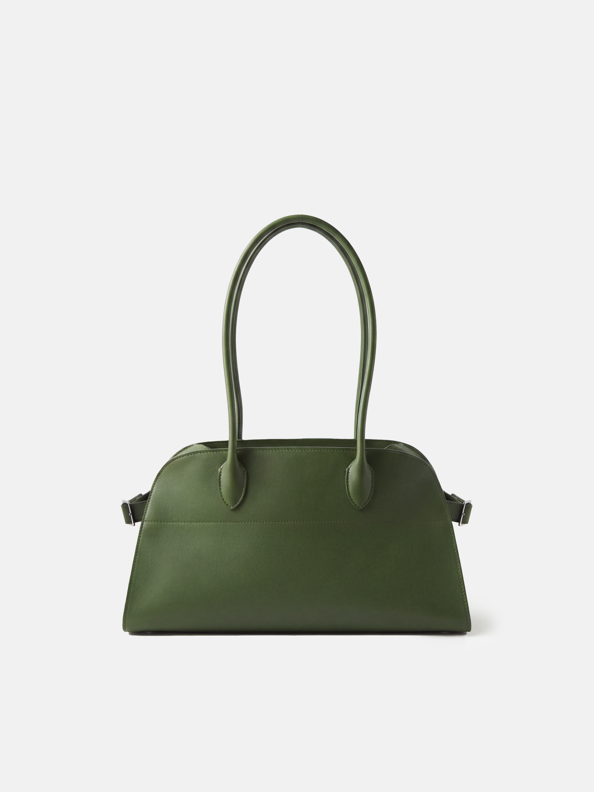 Structured deep navy saddle leather top handle bag with clean curves and elegant trapezoid shape.