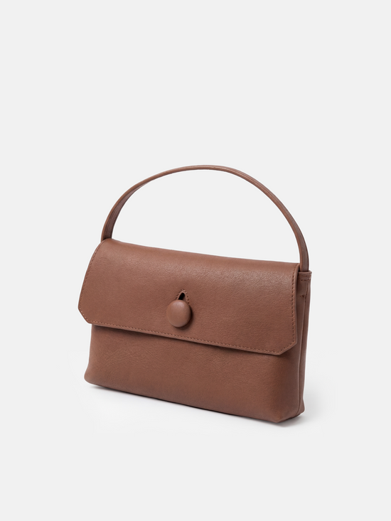 SELVANE Saddle Leather Top-Handle Flap Bag, featuring clean geometry, structured volume, and a precise flap closure.