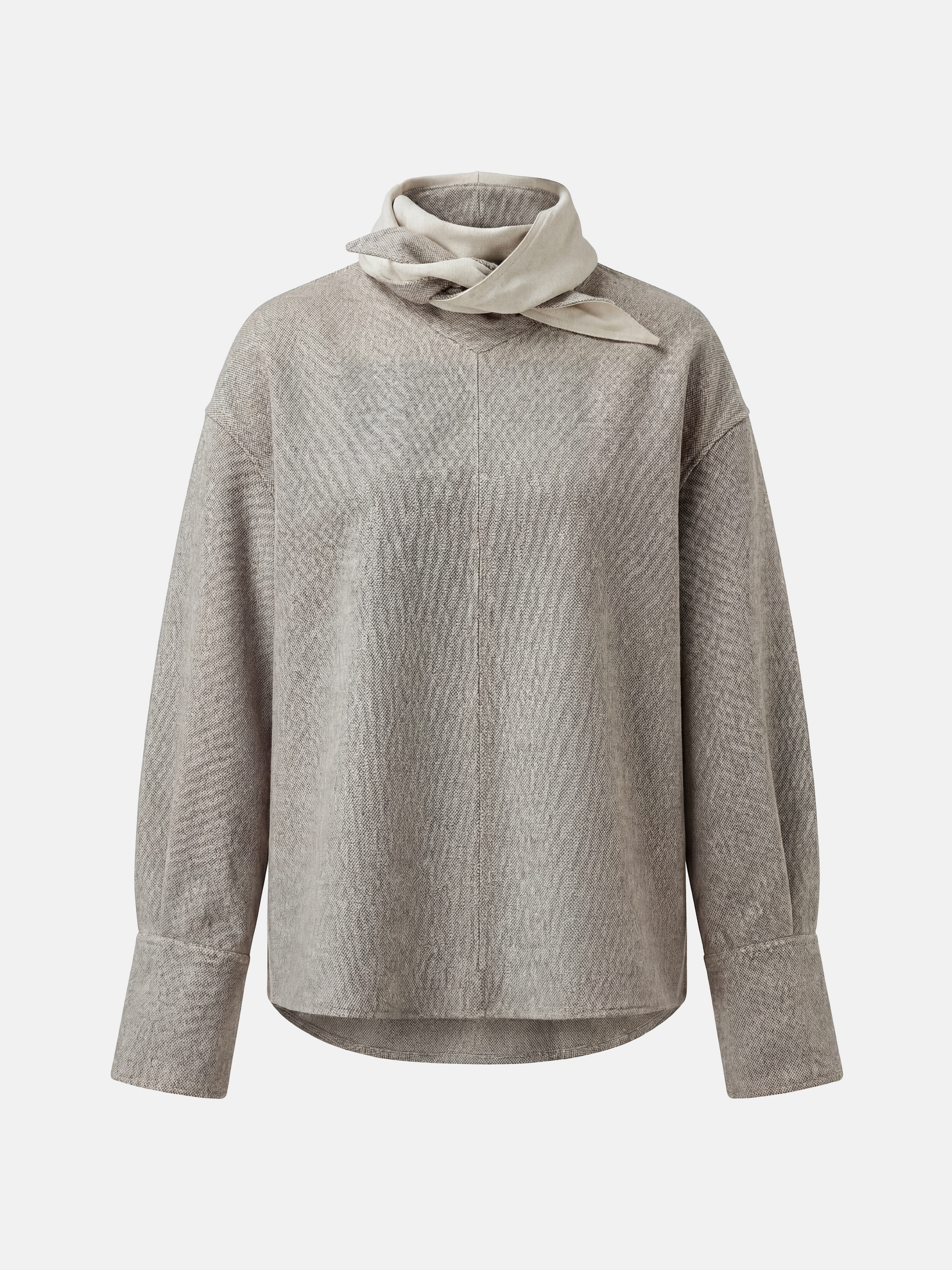 Muted apricot structured top by SELVANE, featuring a clean front seam, sculpted cuffs, and a detachable contrast scarf detail.