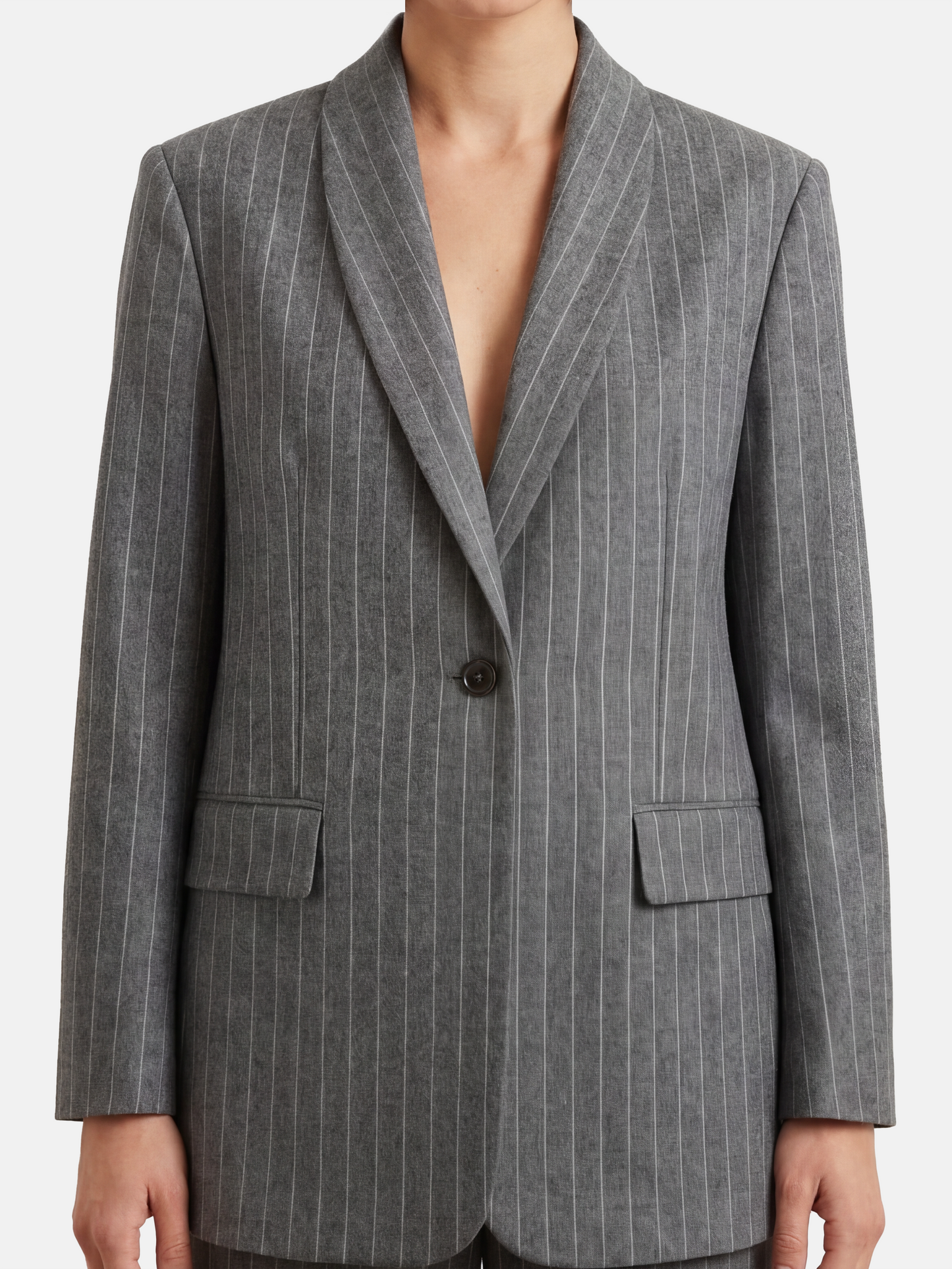 SELVANE Pinstripe Wool Blazer, longline with softened peak lapel and single-button front, tailored for a calm, vertical silhouette.