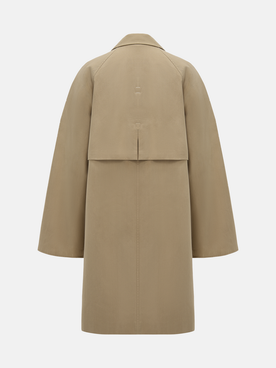 SELVANE light khaki straight-line trench coat with distinctive striped turn-up cuffs, showcasing controlled volume and fluid drape.