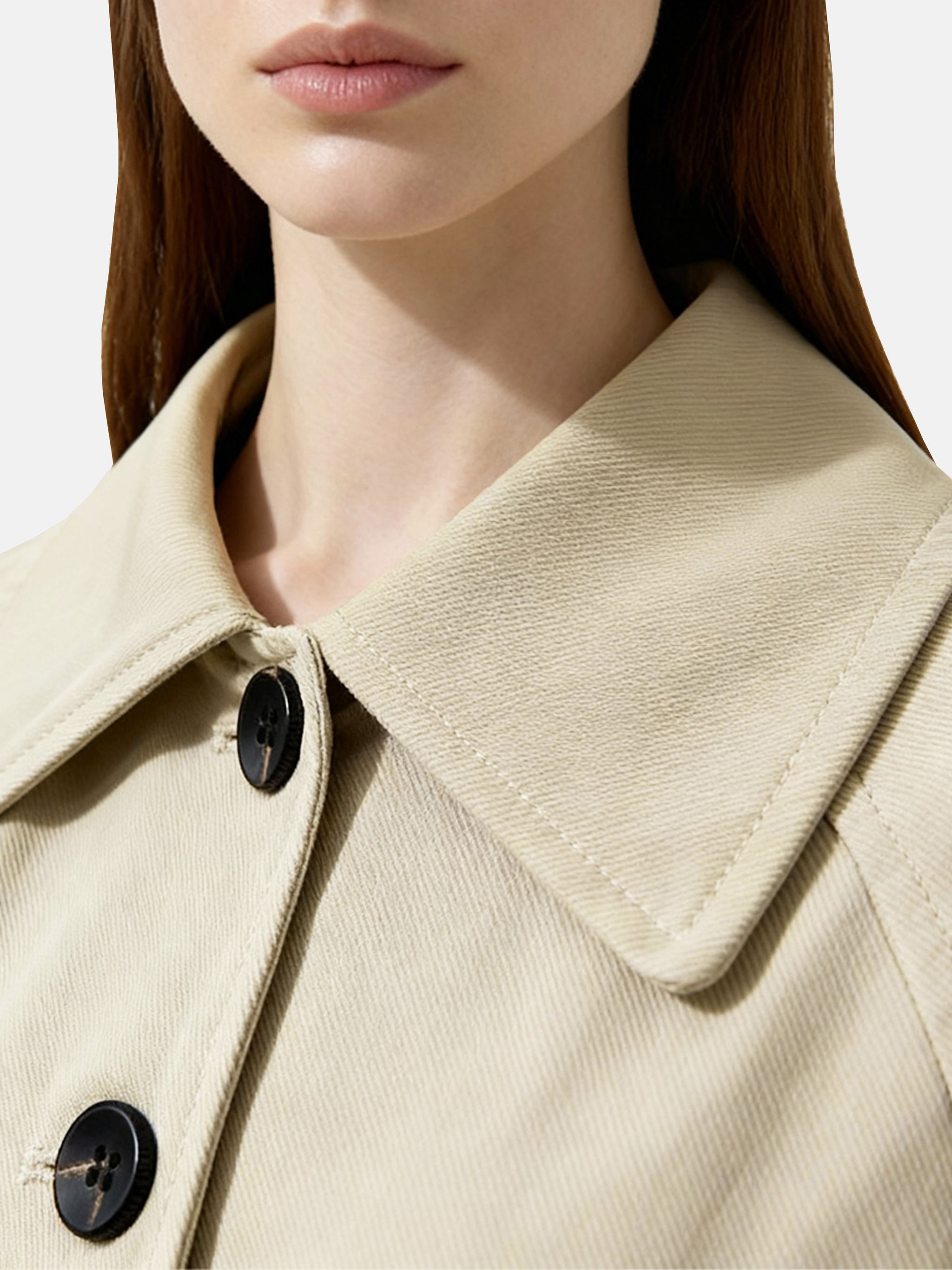 SELVANE light khaki straight-line trench coat with distinctive striped turn-up cuffs, showcasing controlled volume and fluid drape.