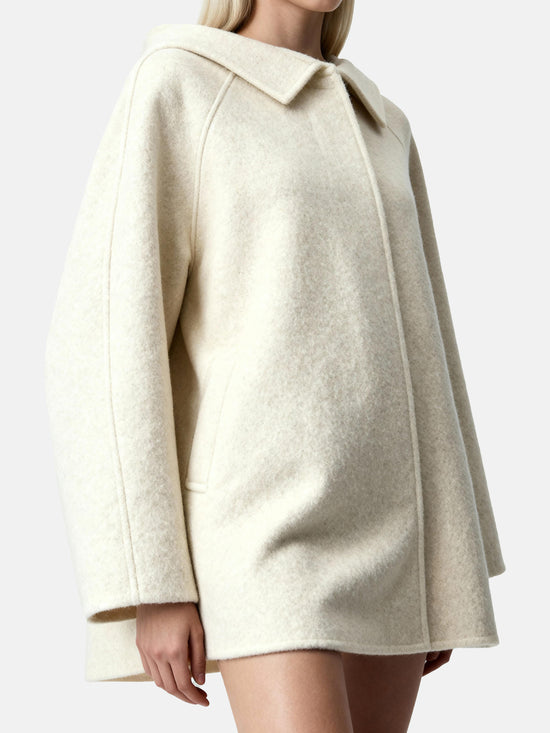 SELVANE cream wool-cashmere hooded coat, A-line silhouette, oversized hood, elegant and serene.
