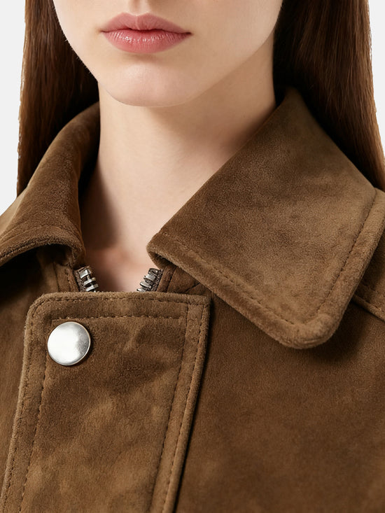 Oversized tan lambskin jacket by SELVANE, featuring a wide pointed collar, ribbed cuffs, and relaxed volume.