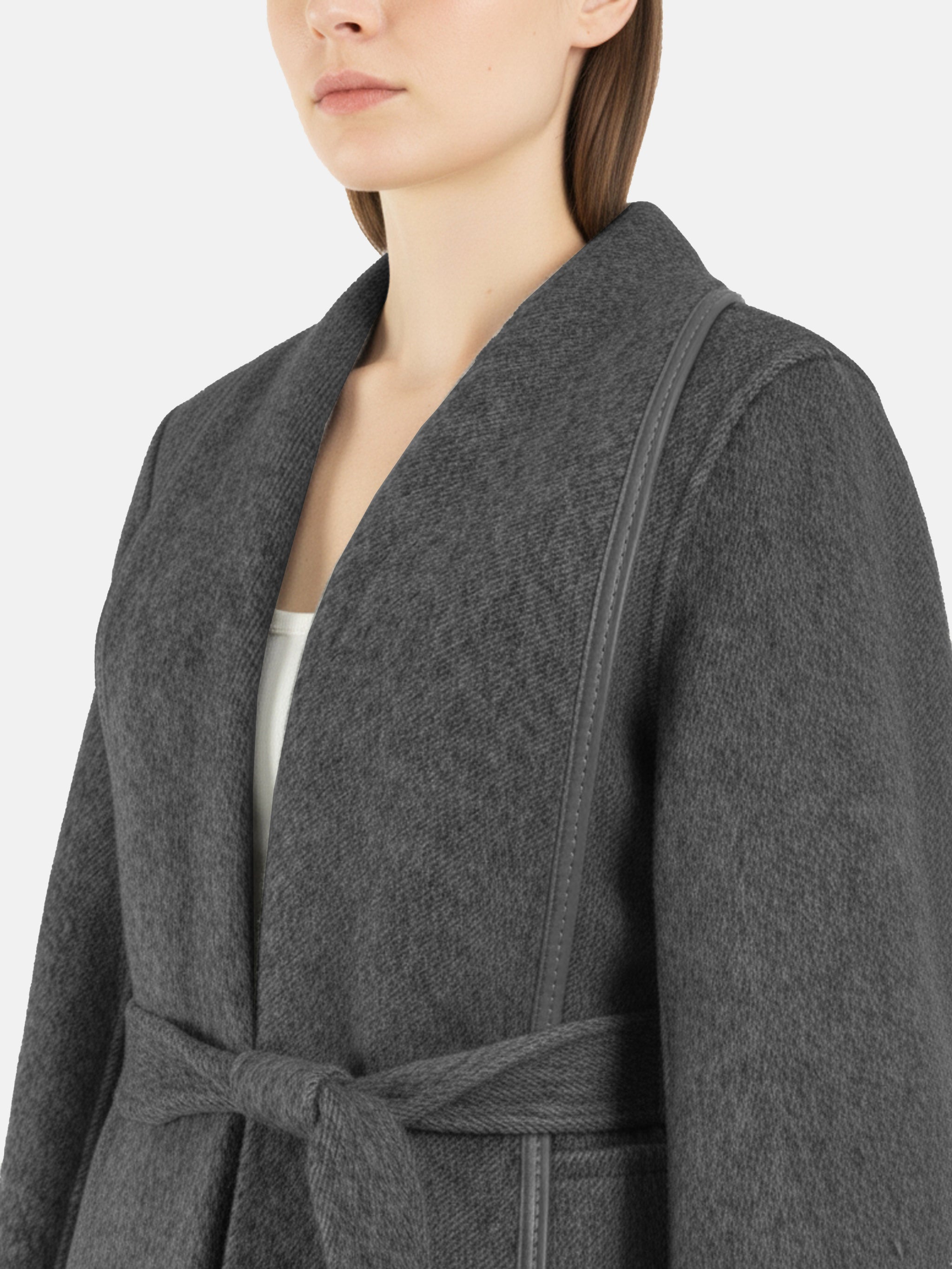 SELVANE Belted Wool Long Coat in a soft wool-llama blend, featuring a fluid drape and clean topstitched edges, worn by a model in a composed stance.