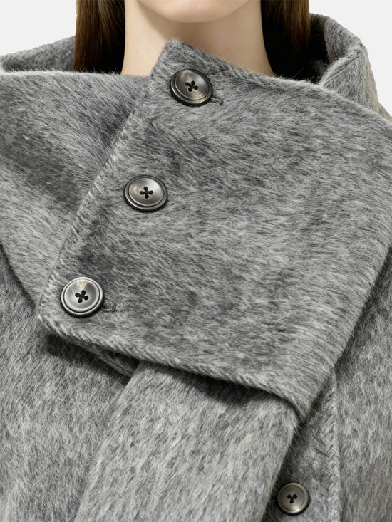 Cropped double-breasted wool-alpaca jacket with integrated scarf collar, styled on a model, front view.