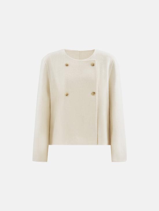 Cropped double-breasted wool-alpaca jacket with integrated scarf collar, styled on a model, front view.