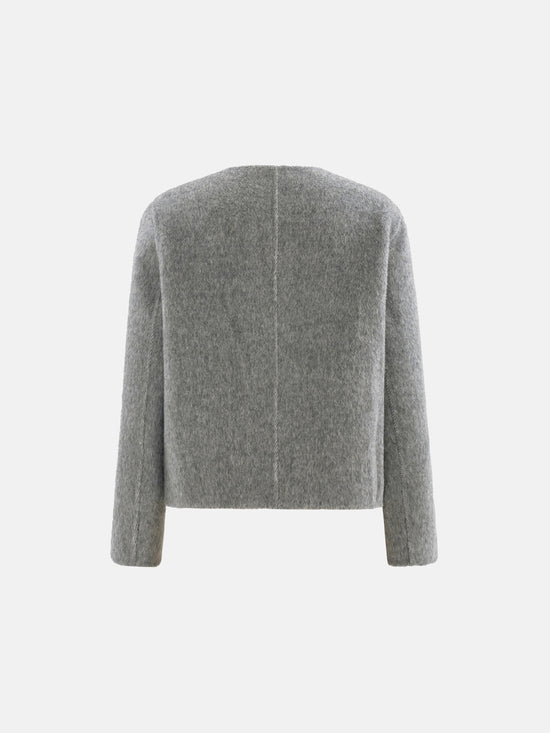 Cropped double-breasted wool-alpaca jacket with integrated scarf collar, styled on a model, front view.