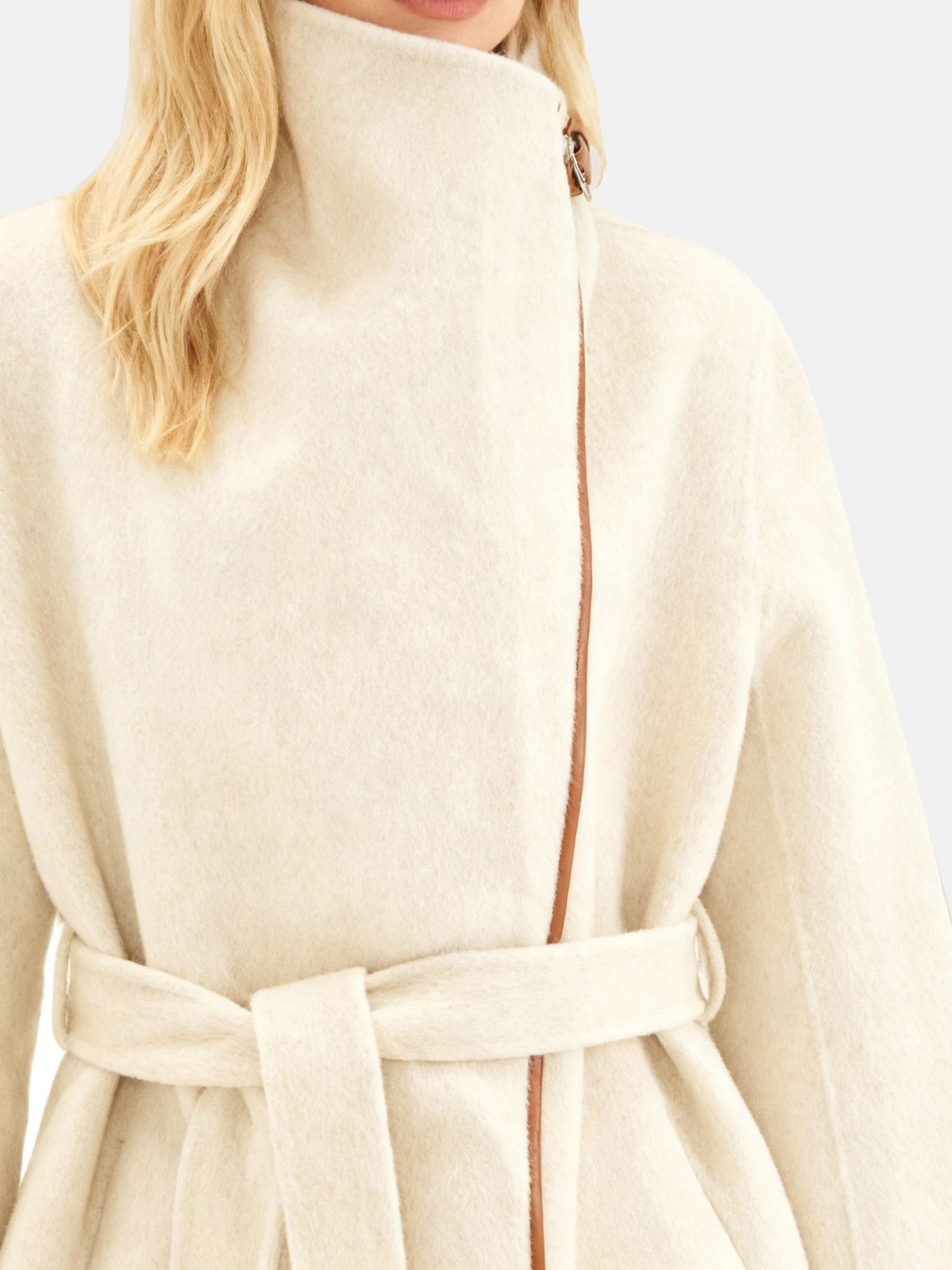 SELVANE Contour Wool Wrap Coat in a light tone with contrast-trim edges and wide shawl collar, draped elegantly.