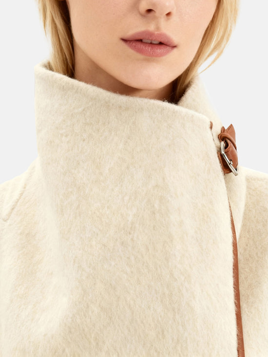 SELVANE Contour Wool Wrap Coat in a light tone with contrast-trim edges and wide shawl collar, draped elegantly.