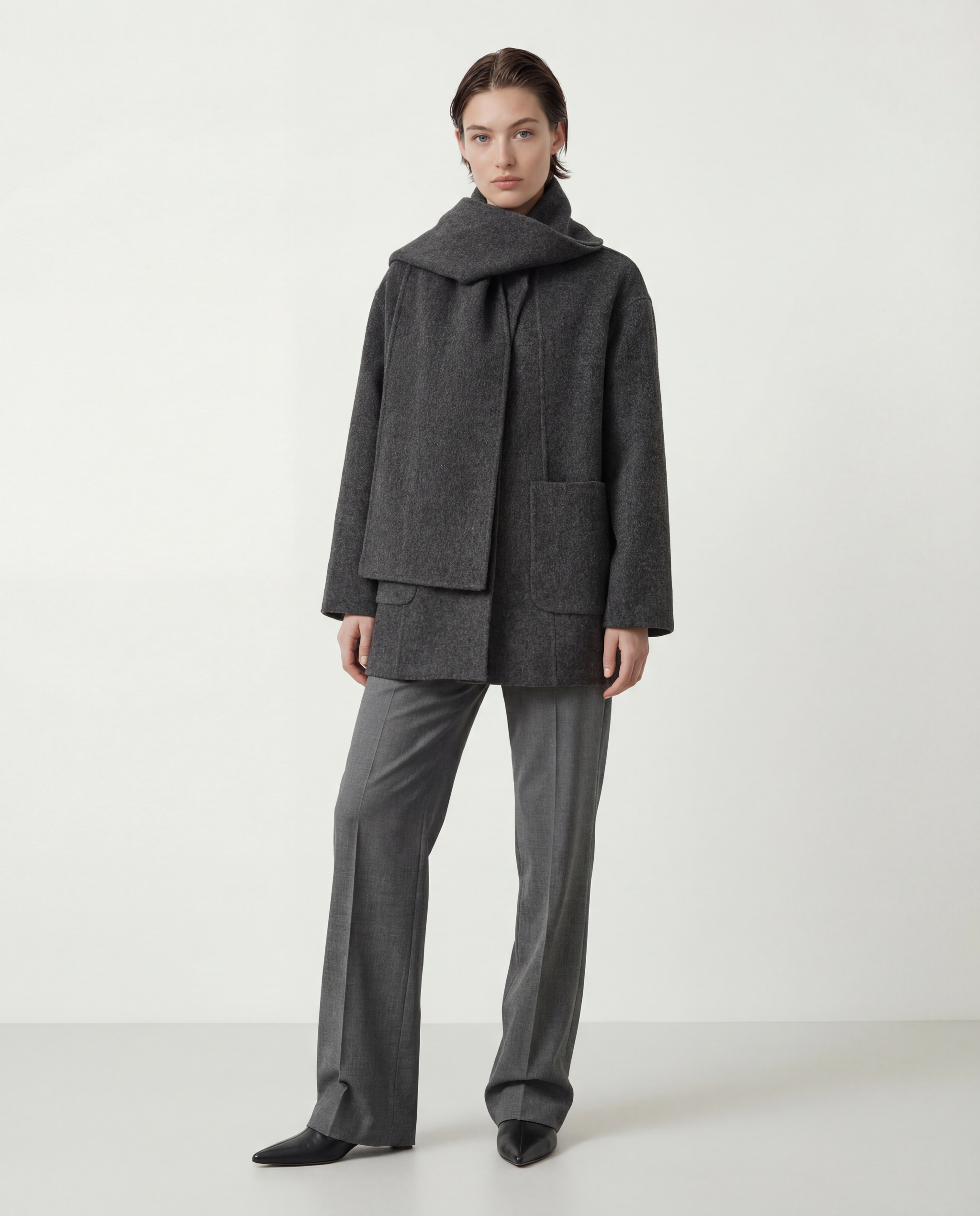 SELVANE Structured Wool Wrap Coat in a neutral tone, featuring a built-in scarf neckline and clean lines, draped elegantly on a figure.