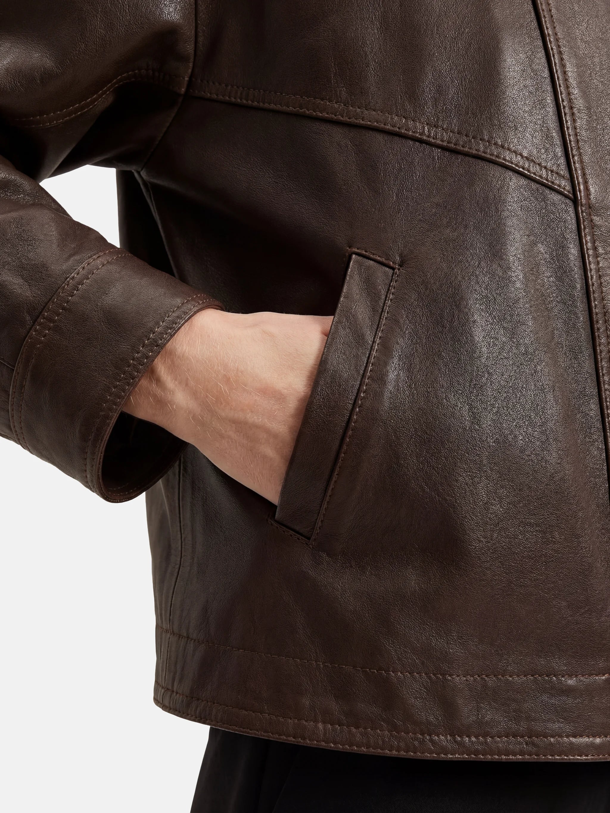 SELVANE Asymmetric Zip-Collar Lambskin Jacket in coffee-toned leather, showcasing its structural lines and urban elegance.