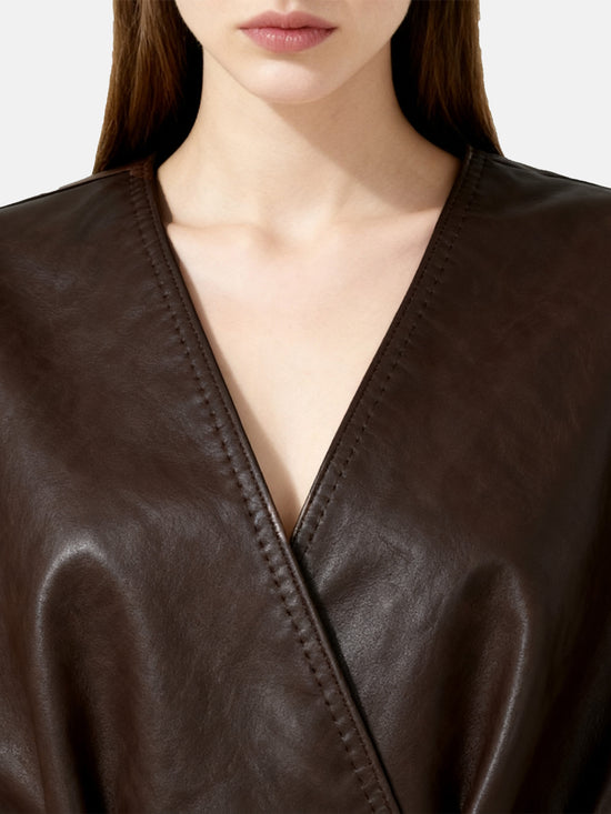 Sleek rich brown lambskin wrap belt jacket, defining the waist with a quiet gesture, clean column silhouette.