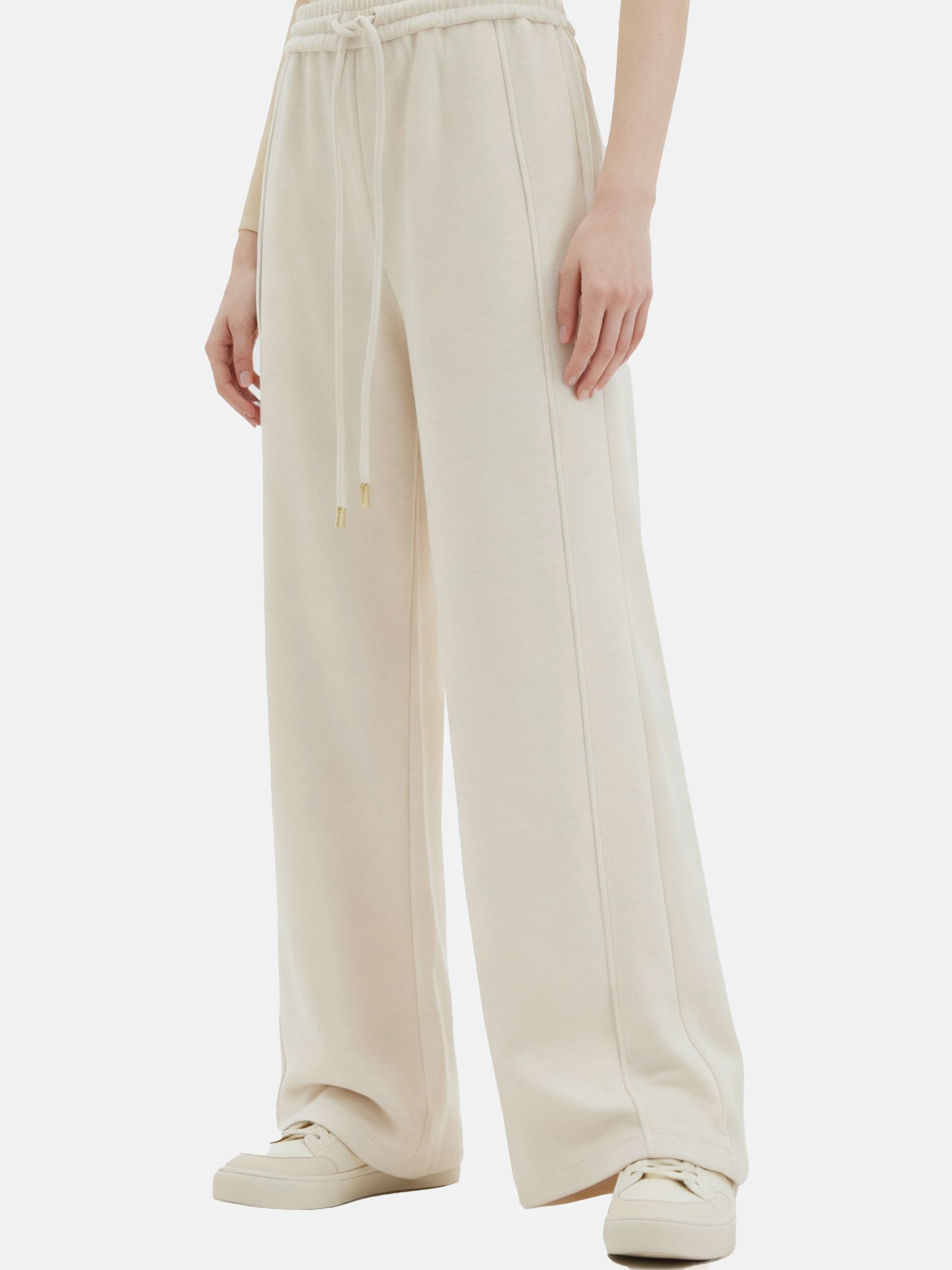 Off-white SELVANE Collared Knit Pullover and Wide-Leg Pants Set, featuring a V-neck and fluid silhouette.