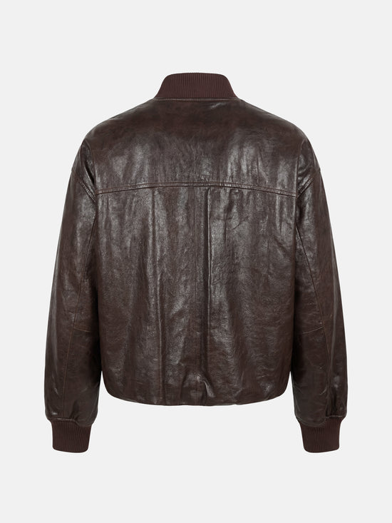SELVANE men's lamb leather bomber jacket in black, featuring ribbed collar, cuffs, and hem, with a clean zip-front design.