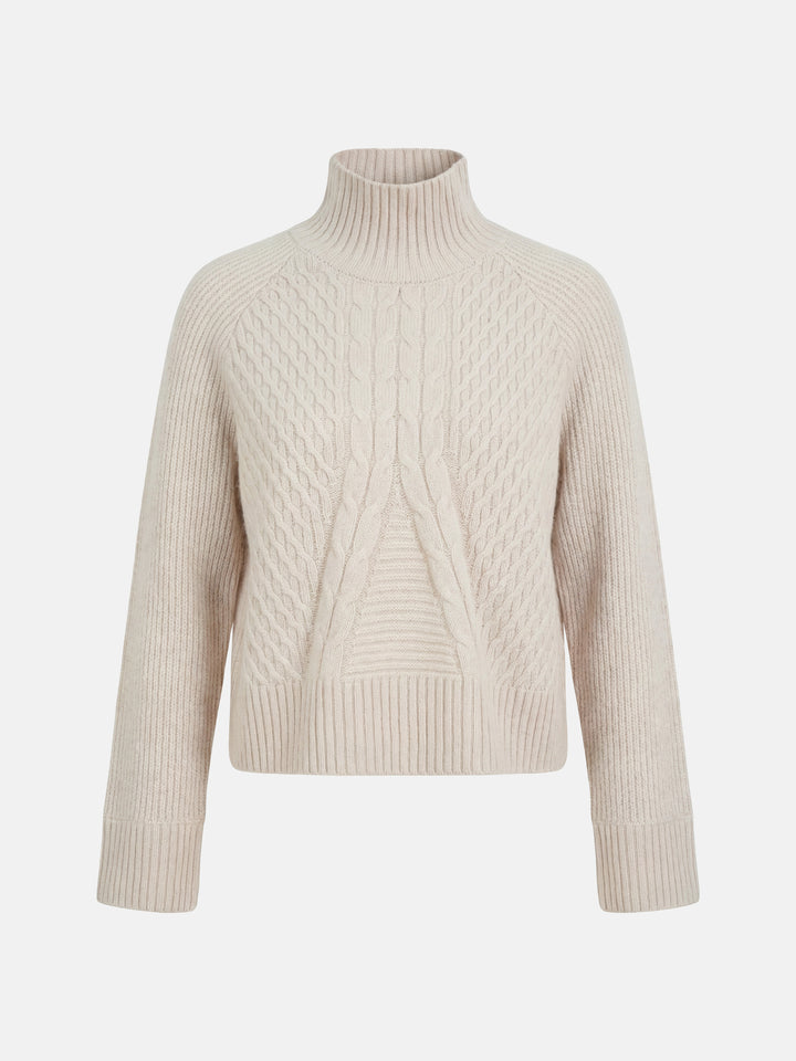 SELVANE Cable Cashmere Turtleneck Sweater in a natural hue, showcasing its refined centered cable panel, structured neckline, and relaxed fit.