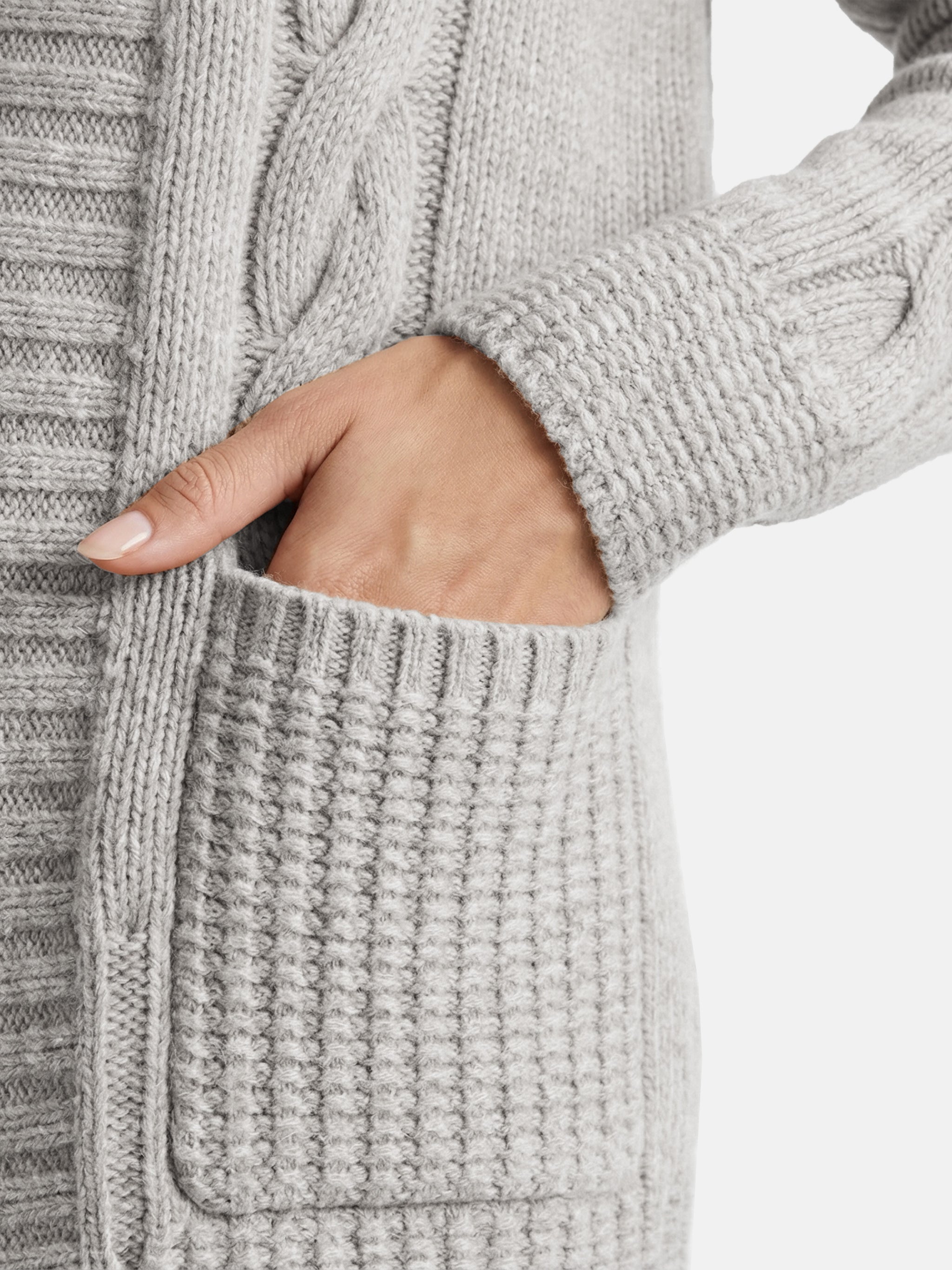 SELVANE Cashmere Cable Shawl Cardigan in a relaxed, open-front silhouette with distinctive cable-knit sleeves.