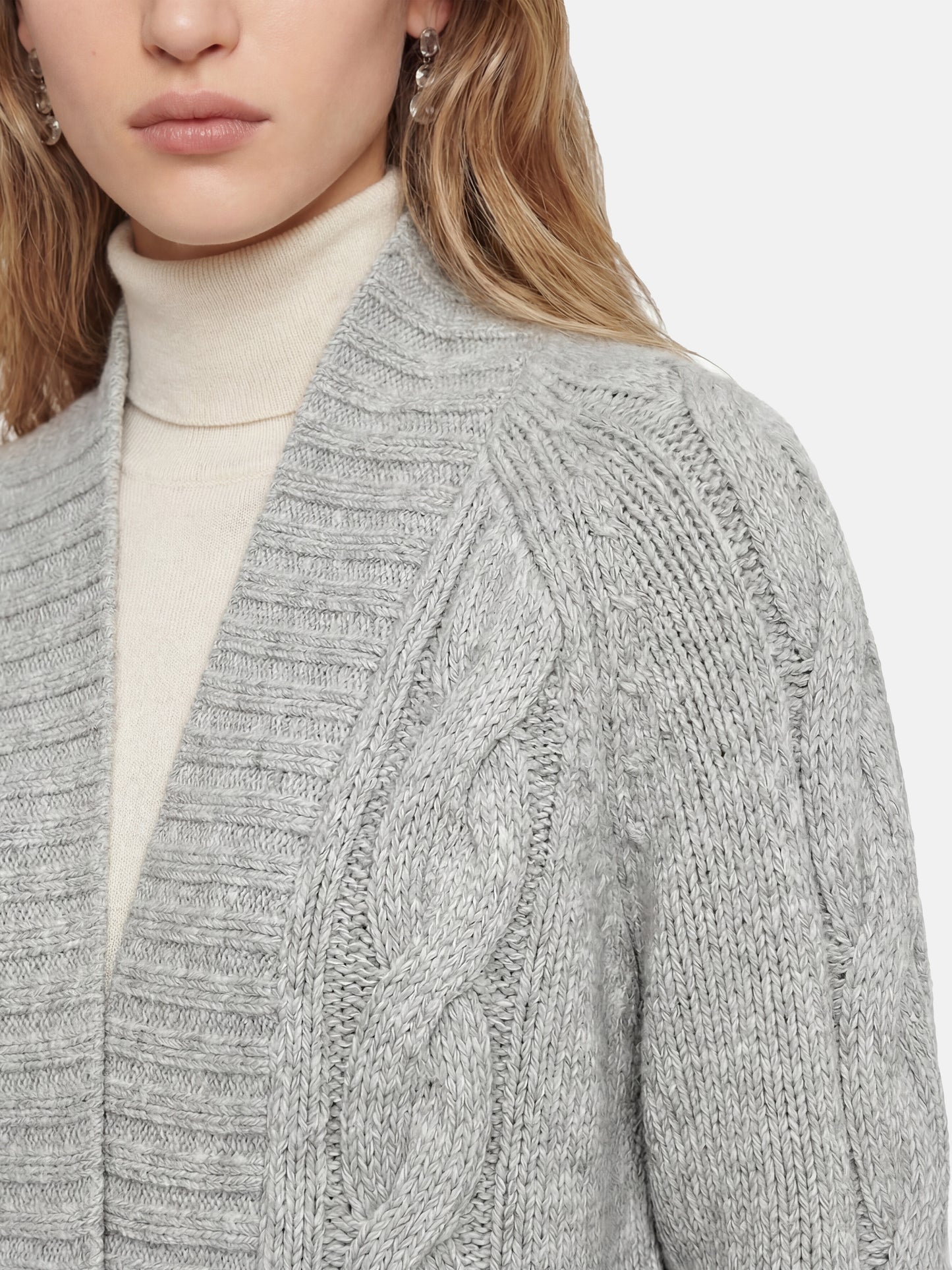 SELVANE Cashmere Cable Shawl Cardigan in a relaxed, open-front silhouette with distinctive cable-knit sleeves.