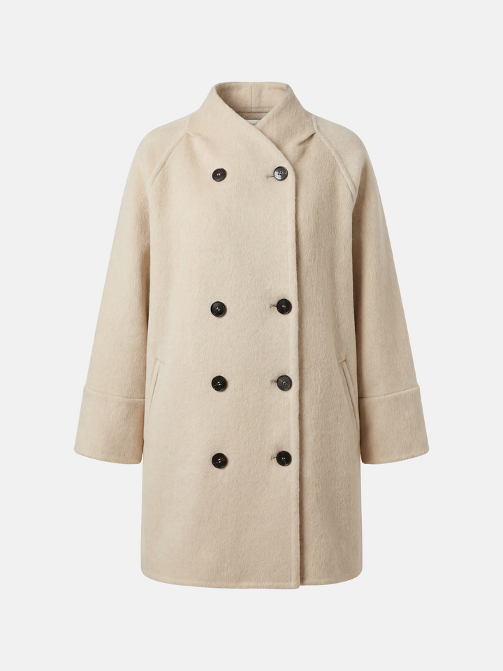 SELVANE double-breasted camel hair coat with raglan sleeves, oversized fit, above-knee length, warm ivory tone.