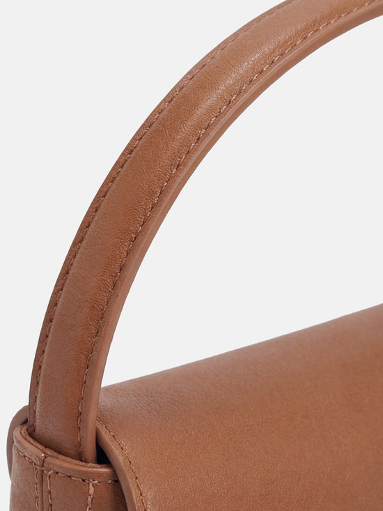 SELVANE Saddle Leather Top-Handle Flap Bag, featuring clean geometry, structured volume, and a precise flap closure.