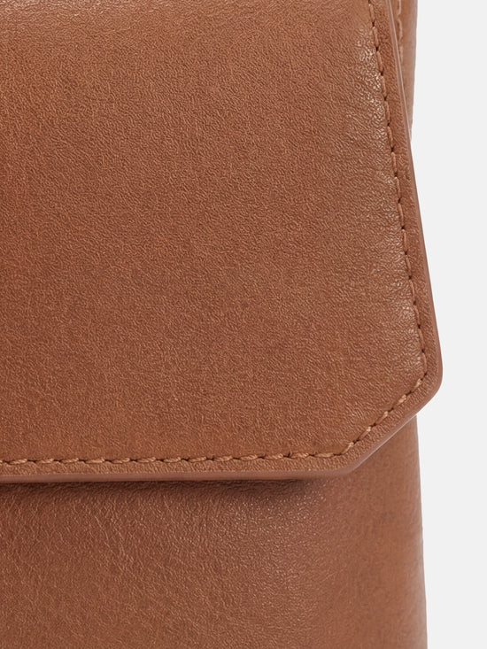 SELVANE Saddle Leather Top-Handle Flap Bag, featuring clean geometry, structured volume, and a precise flap closure.
