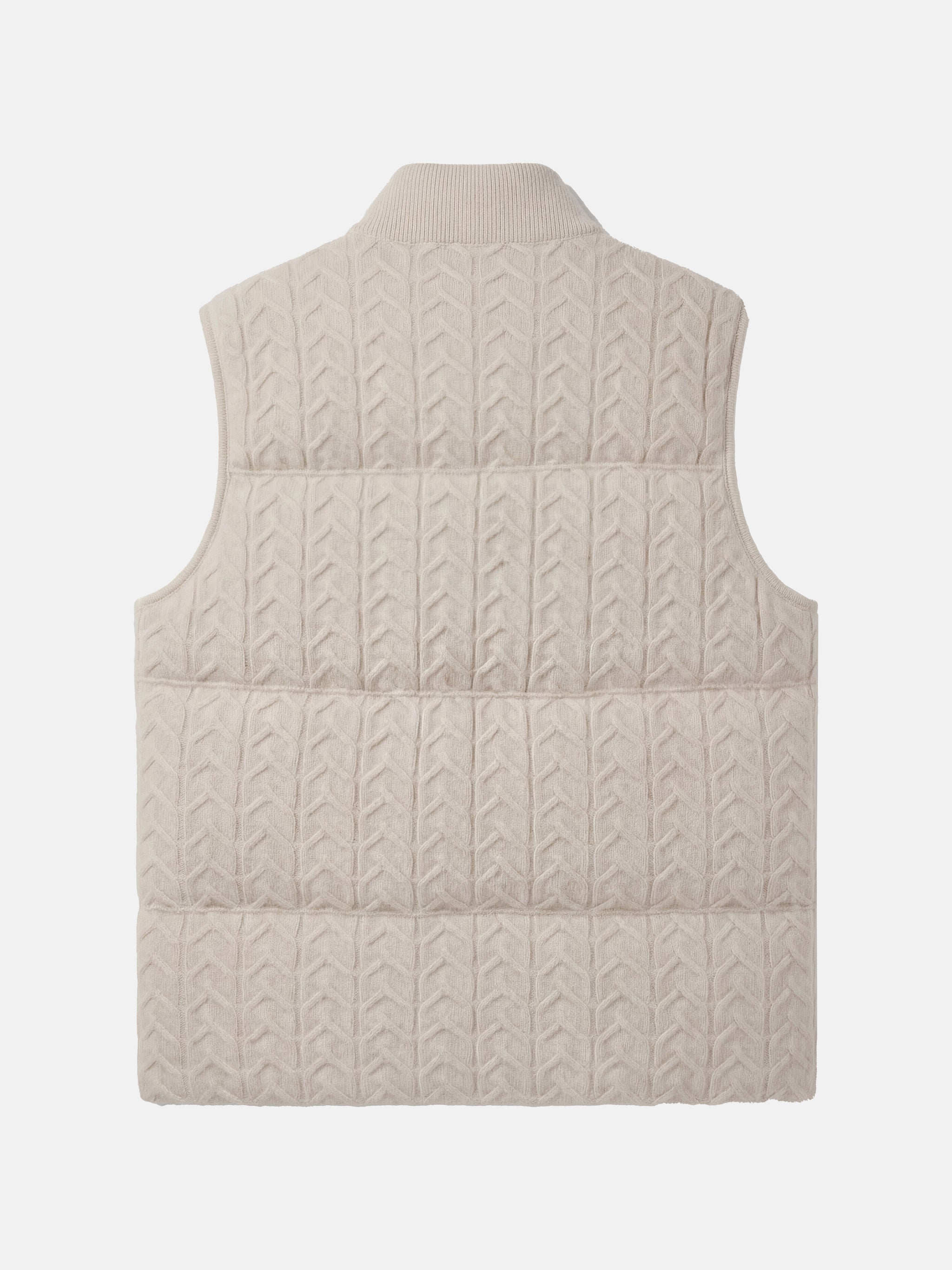 SELVANE zip-front cashmere vest with stand collar and subtle cable texture, shown layered for crisp silhouette.
