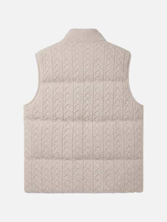 SELVANE zip-front cashmere vest with stand collar and subtle cable texture, shown layered for crisp silhouette.