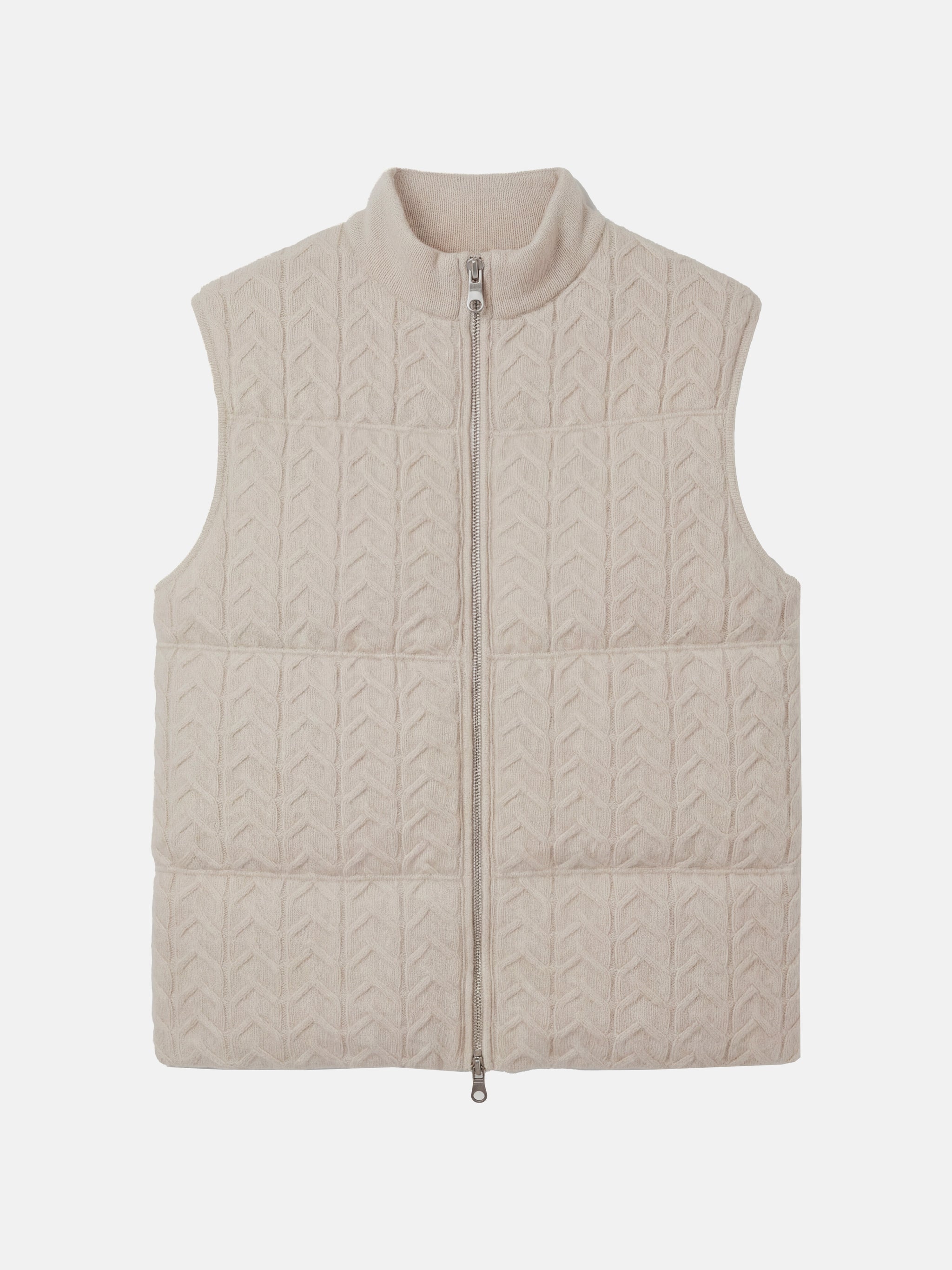 SELVANE zip-front cashmere vest with stand collar and subtle cable texture, shown layered for crisp silhouette.
