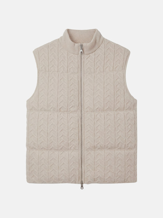 SELVANE zip-front cashmere vest with stand collar and subtle cable texture, shown layered for crisp silhouette.
