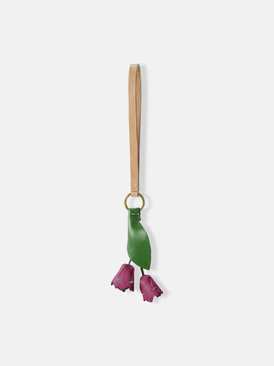 Selvane Tulip Pendant Bag Charm featuring a slender leather strap and a delicate tulip silhouette, designed as a quiet accent.