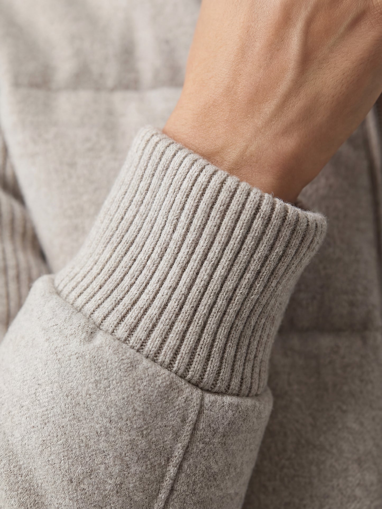 SELVANE Cashmere Quilted Zip Jacket in a compact silhouette, featuring a quilted front and rib-knit sleeves.