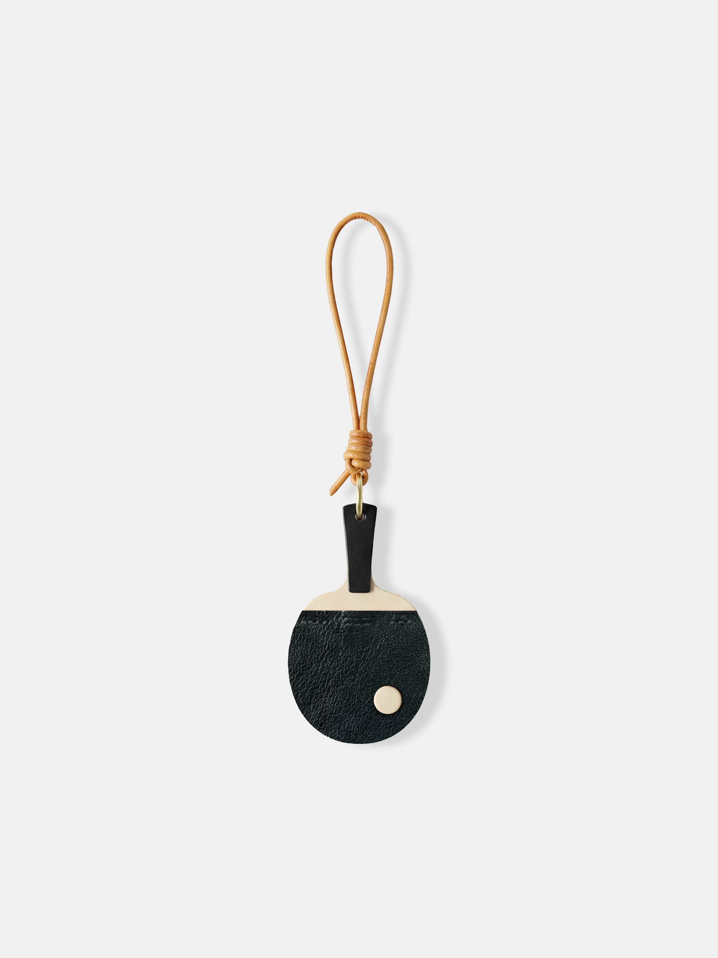 SELVANE Ping Pong Racket Bag Charm in bold red enamel, minimalist design with slim handle, long loop, and raised 'ball' detail.
