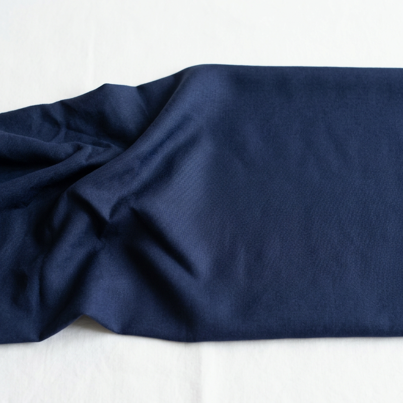 Steam or iron on medium heat for the pencil skirt — the Tencel blend holds pressed lines beautifully