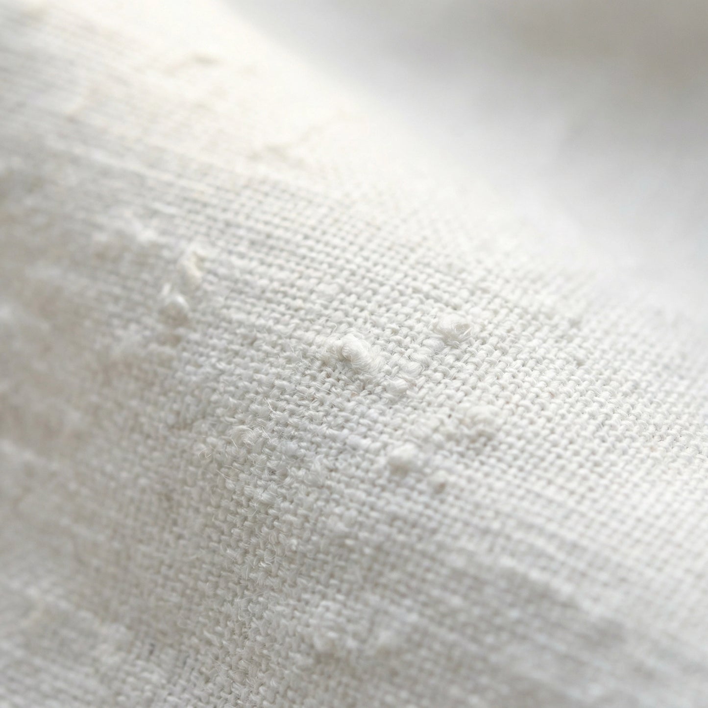 SELVANE white linen-cotton Embroidered Shirt & Shorts Set. Oversized shirt with scattered text, puffed sleeves, French cuffs, matching shorts.