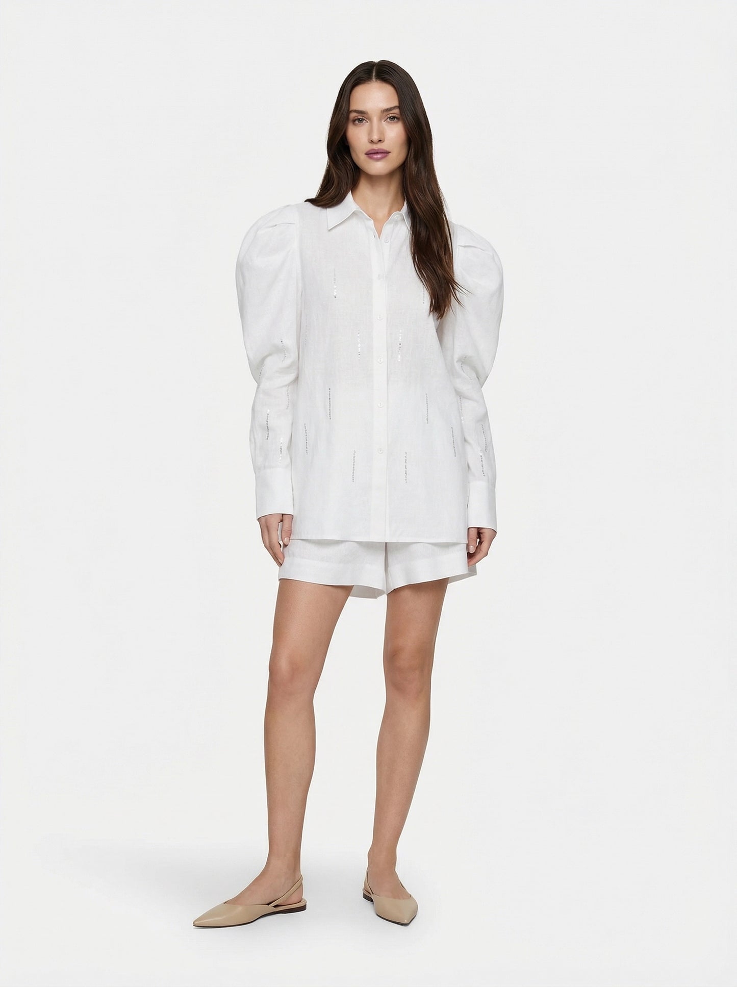 SELVANE white linen-cotton Embroidered Shirt & Shorts Set. Oversized shirt with scattered text, puffed sleeves, French cuffs, matching shorts.