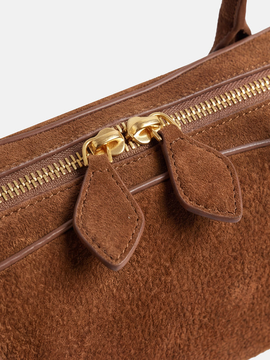 SELVANE Sausage Zipper Shoulder Bag in custom leather, longline, low-profile, softly rounded, with a streamlined zipper top.