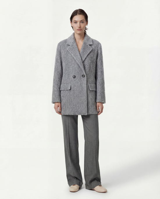 SELVANE Soft-Texture Double-Breasted Coat in a rich, brushed wool-cashmere blend, featuring a clean notch lapel and relaxed volume.