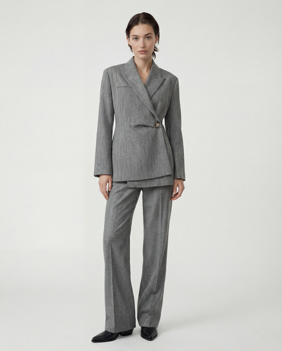 SELVANE Diagonal-Closure Asymmetric Collar Blazer in quiet grey. Sharp shoulders, diagonal closure, and asymmetric collar define its long, clean silhouette.