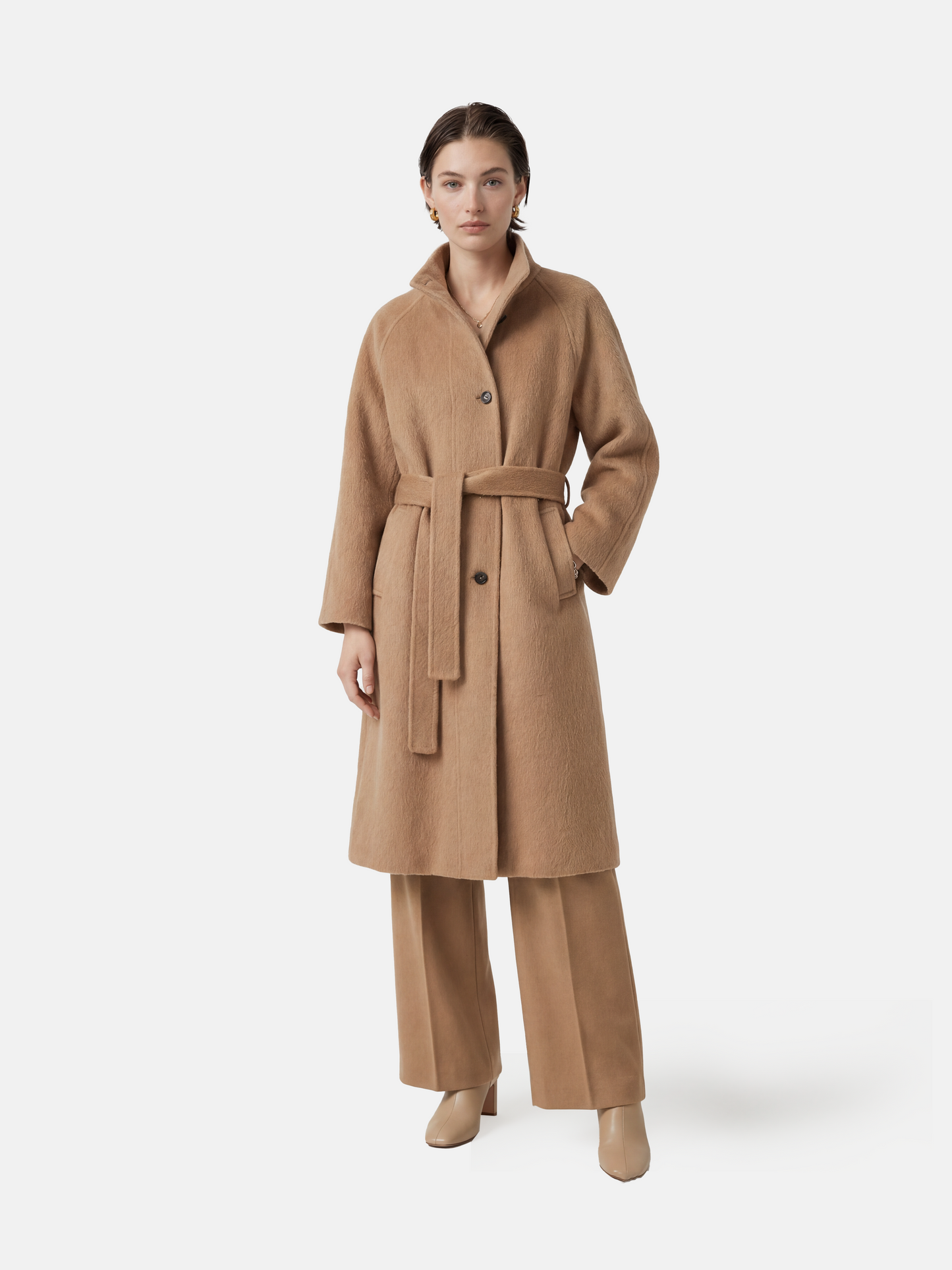 Full-length SELVANE camelhair belted coat with raglan sleeves and high stand collar, showcasing its elongated silhouette and plush texture.