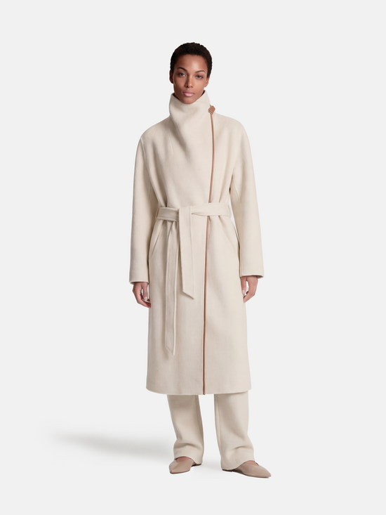 SELVANE Contour Wool Wrap Coat in a light tone with contrast-trim edges and wide shawl collar, draped elegantly.