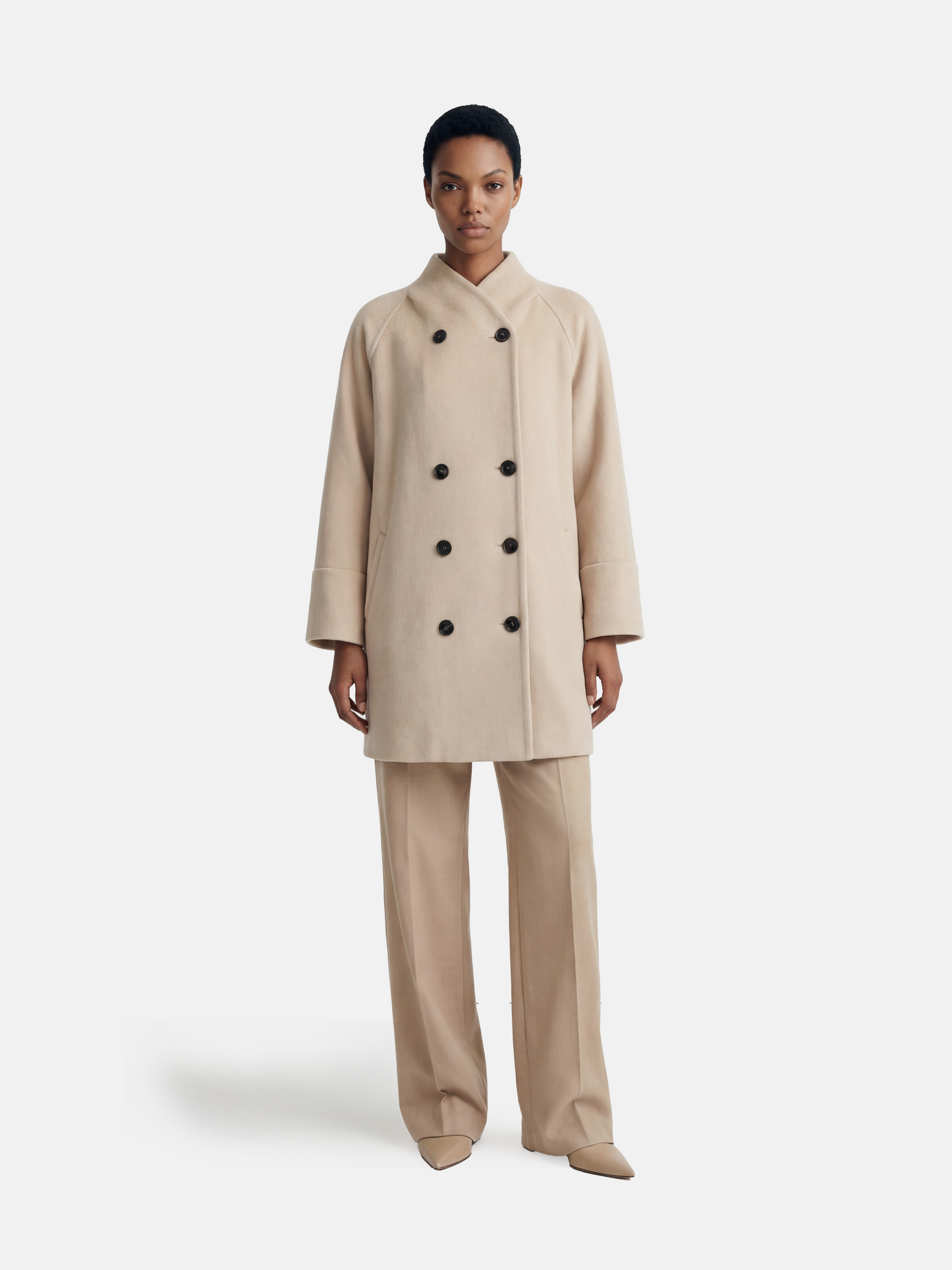 SELVANE double-breasted camel hair coat with raglan sleeves, oversized fit, above-knee length, warm ivory tone.