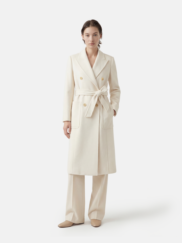 SELVANE Belted Double-Breasted Cashmere Coat in a long, clean silhouette with sharp peak lapels and self-belt.