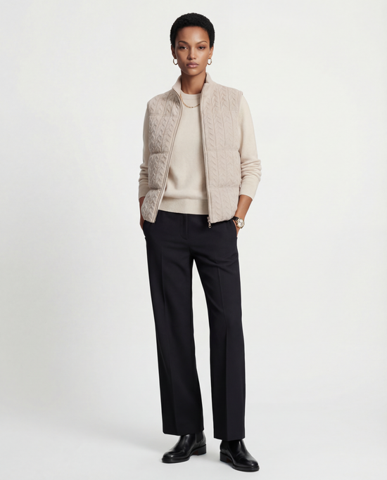 SELVANE zip-front cashmere vest with stand collar and subtle cable texture, shown layered for crisp silhouette.