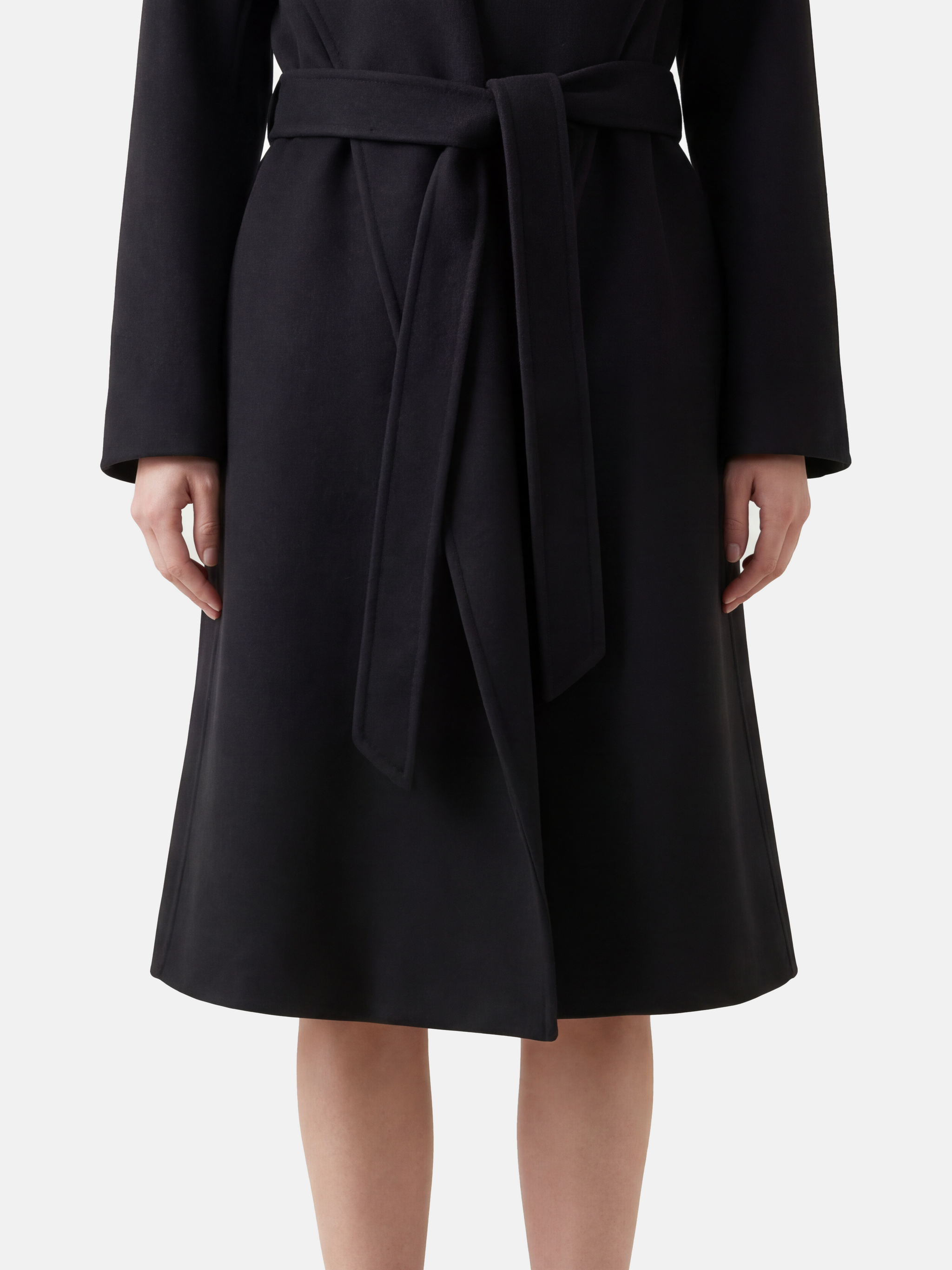 SELVANE mid-length wrap coat in quiet camel pure cashmere, with exaggerated shawl collar and long belt, for elegant motion.