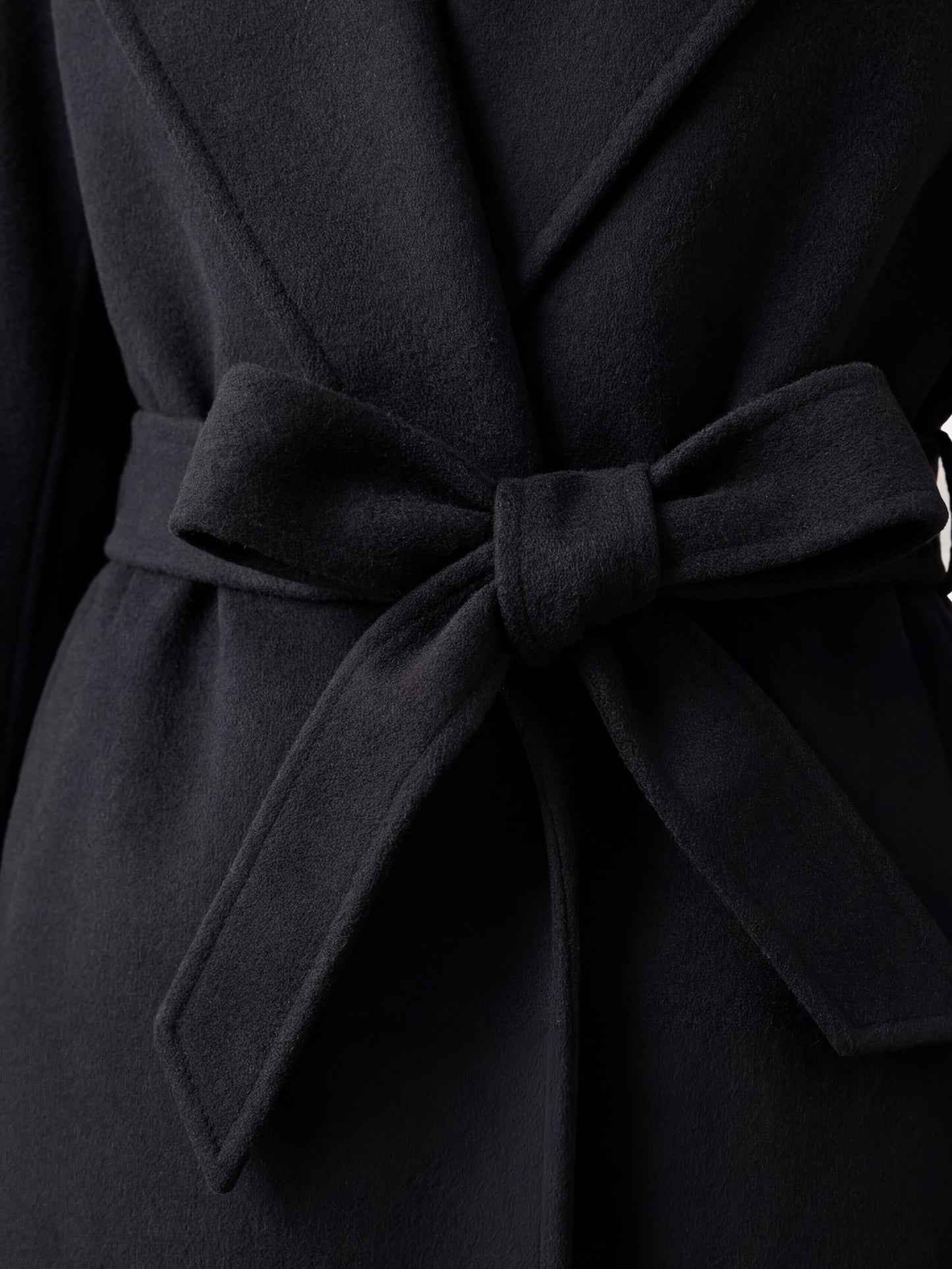 SELVANE mid-length wrap coat in quiet camel pure cashmere, with exaggerated shawl collar and long belt, for elegant motion.