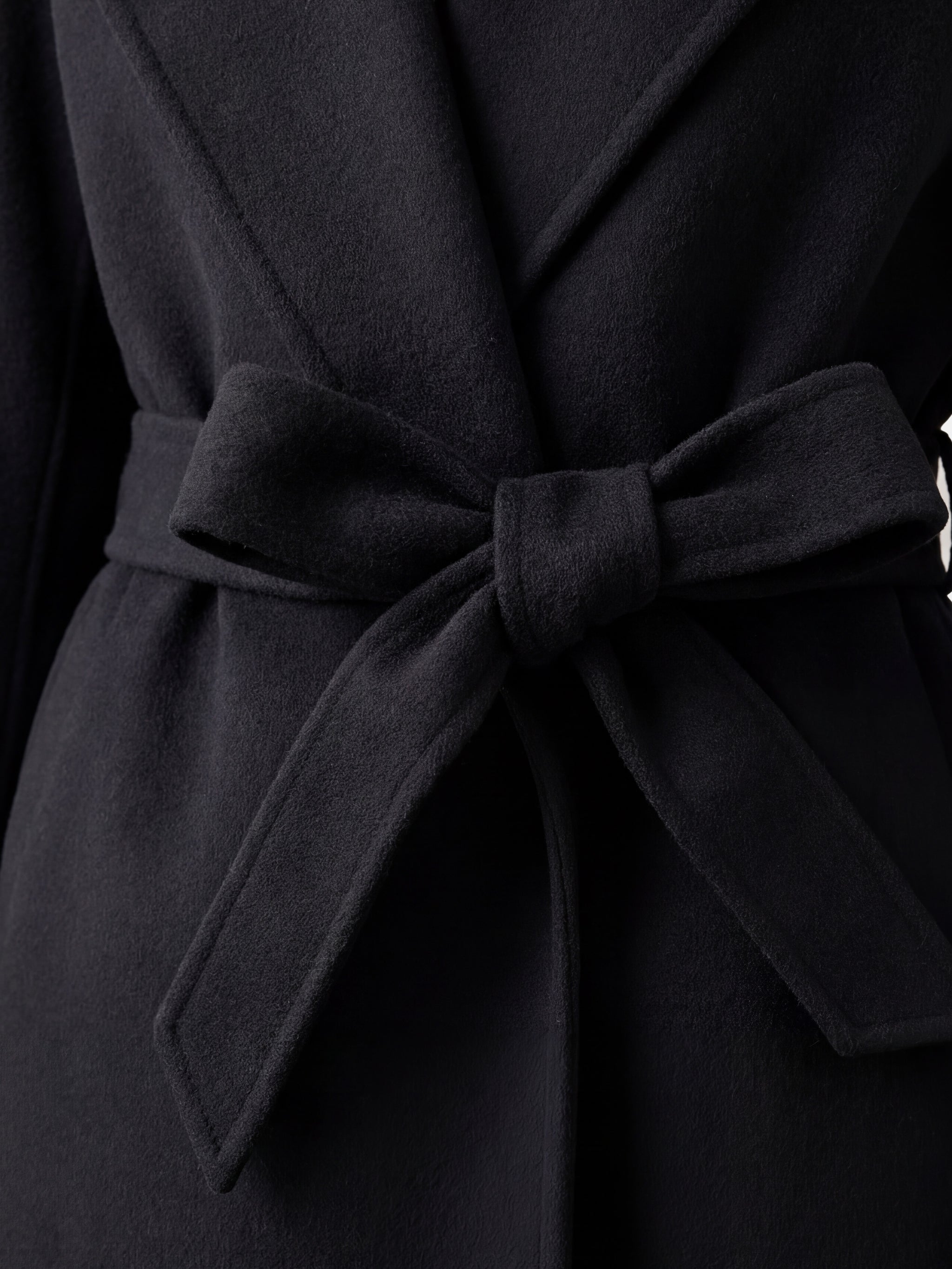 SELVANE mid-length wrap coat in quiet camel pure cashmere, with exaggerated shawl collar and long belt, for elegant motion.