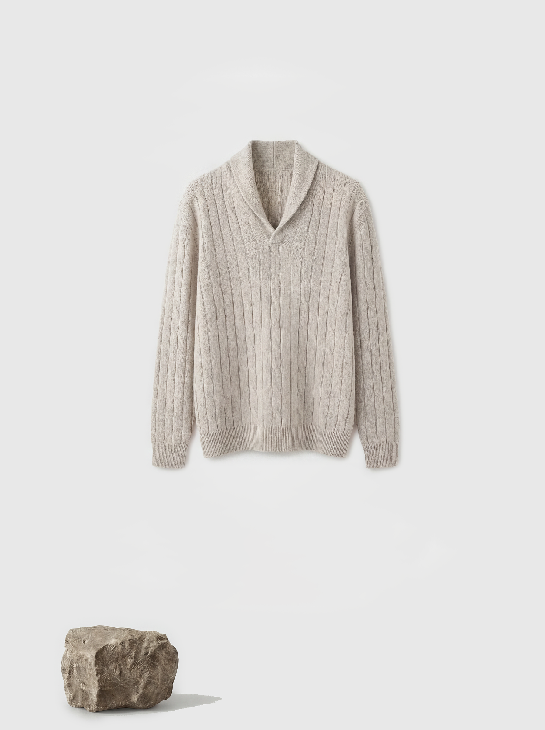 SELVANE Cable-Knit Shawl-Collar Cashmere Sweater in a rich, natural hue, showcasing its vertical rib-and-cable texture and relaxed fit.